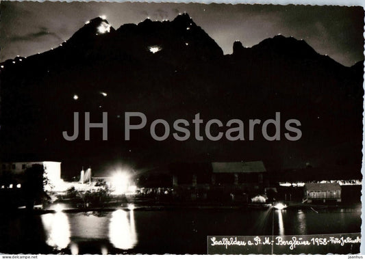 Saalfelden a. St. M. - Bergfeuer 1958 - town - mountains - night view - old postcard - Austria - unused - JH Postcards