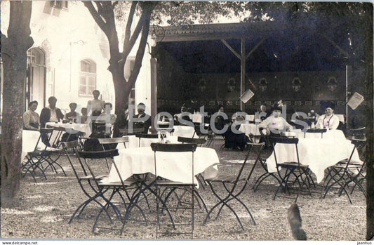 Innsbruck - Gartenrestaurant - Gäste im Sommergarten - Gasthof Johann Hundegger - old postcard - 1900s - Austria - used - JH Postcards