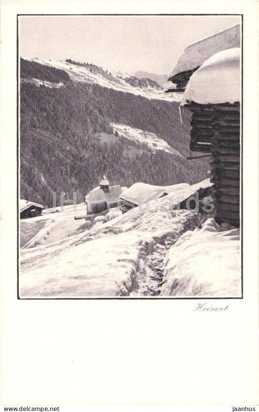 Heimat - snowy mountain slope church and houses in valley - Series - 2430 - old postcard - Switzerland - unused - JH Postcards