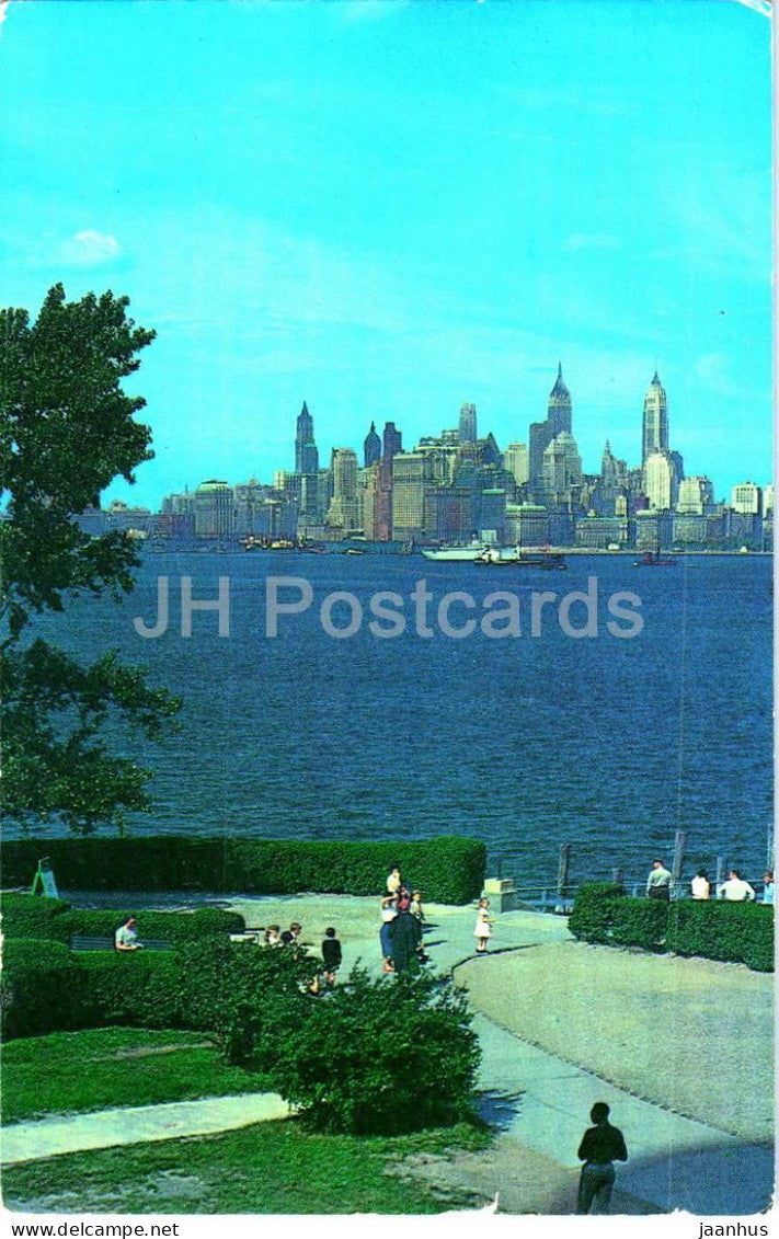 The famous New York Skyline as seen from Liberty Island - Manhattan harbor - USA - used - JH Postcards