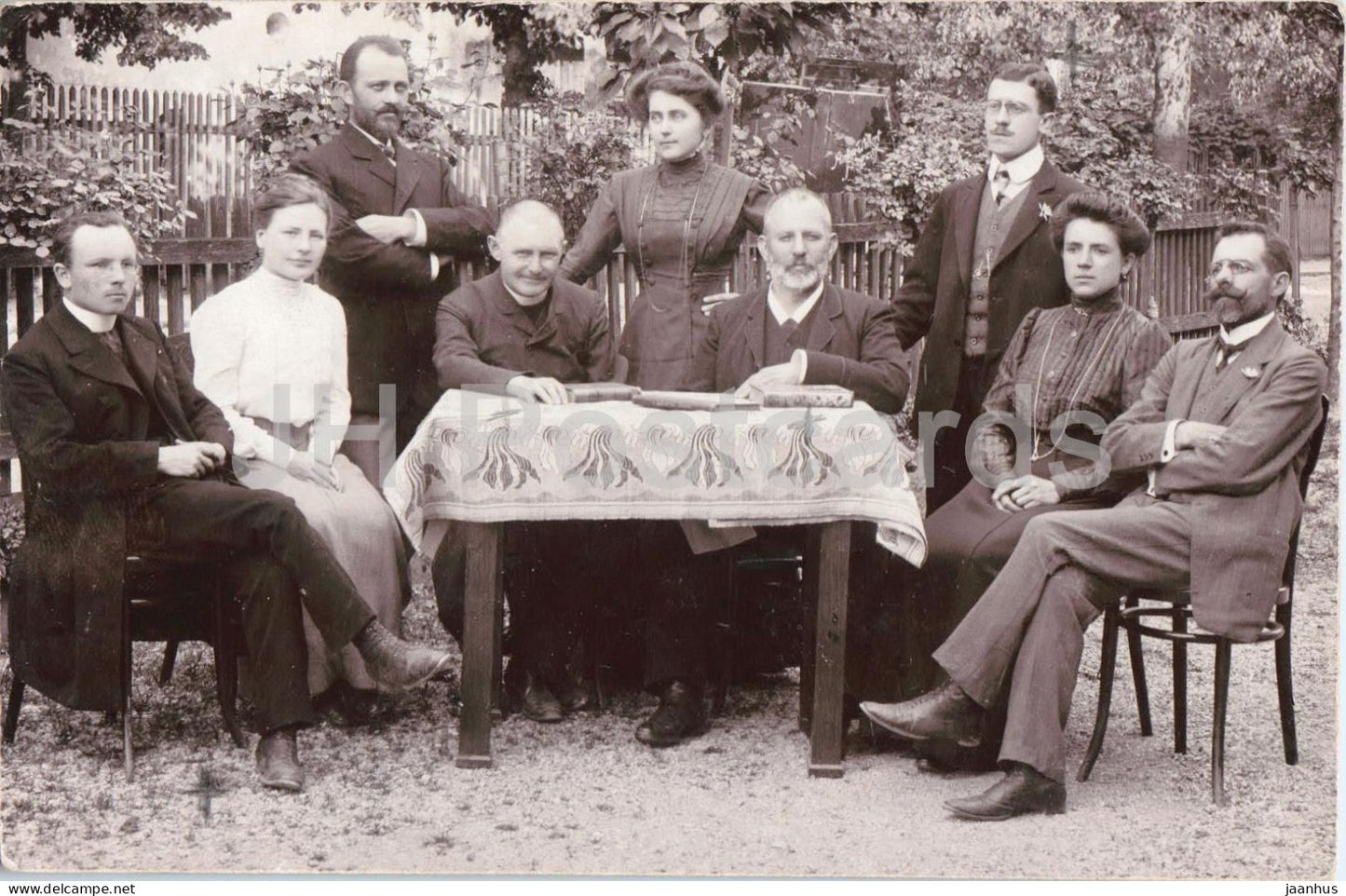 group portrait of teachers seated at a table outdoors - photo - old postcard - 1945 - Austria - used - JH Postcards
