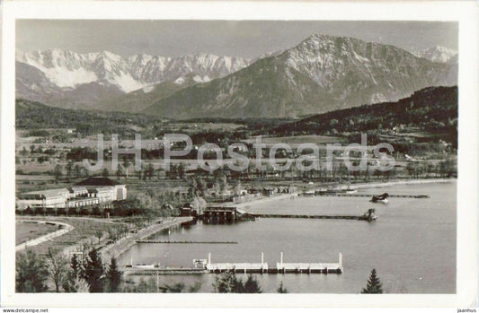 Klagenfurt See mit Koschutta - panoramic view with lake piers - photo - old postcard - Austria - unused - JH Postcards