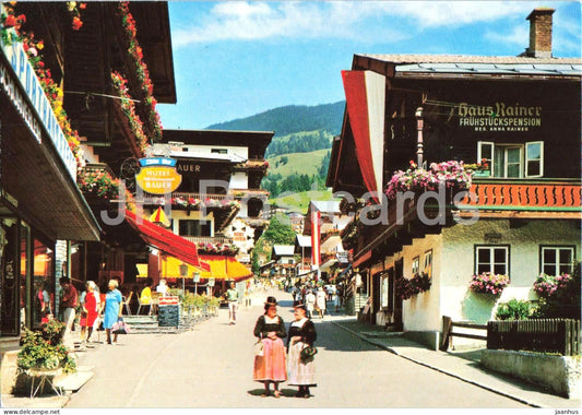 oöhenluftkurort Saalbach - Dorfstrasse - Haus Rainer - village - street - traditional costume - 748 - Austria - used - JH Postcards