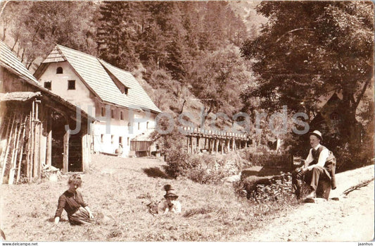family by the building - Alps - photo - old postcard - 1909 - Austria - used - JH Postcards