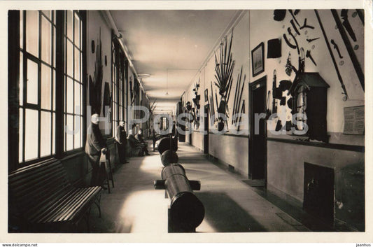 K.K.M.I. Bronbeek Museum - corridor - cannon - interior - old postcard - Netherlands - unused - JH Postcards