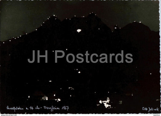Saalfelden a. St. M. - Bergfeuer 1957 - town - mountains - night view - 1 - old postcard - Austria - unused - JH Postcards