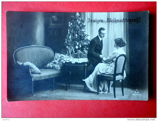 christmas greeting card - couple - man and woman - christmas tree - 4604-6 - circulated in Estonia Tallinn 1924 - JH Postcards