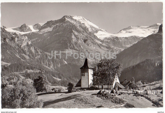 Lauenen 1259 m - die Kirche - Plaffenhorn - Wildhorn - Geltenhorn - church - 13491 - Switzerland - 1953 - used - JH Postcards