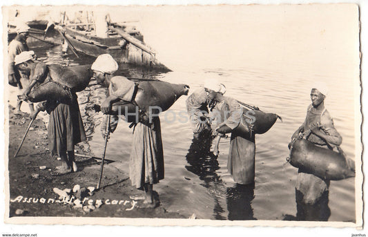 Aswan - Assuan Water Carry - old postcard - Egypt - used - JH Postcards