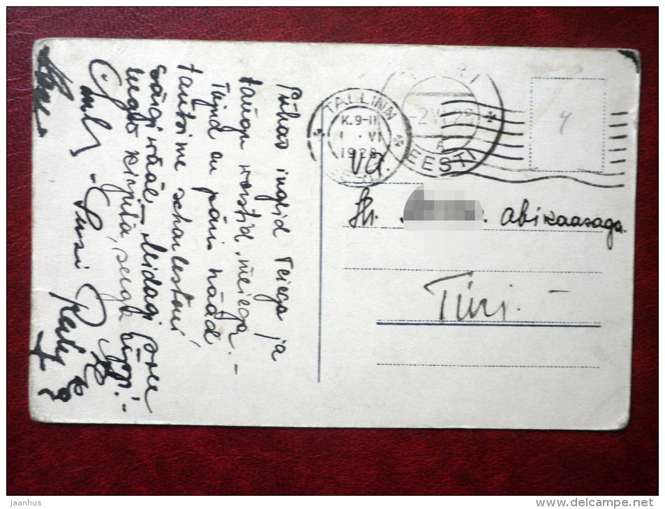 man and woman - man by the window - circulated in 1928 - Estonia - used - JH Postcards