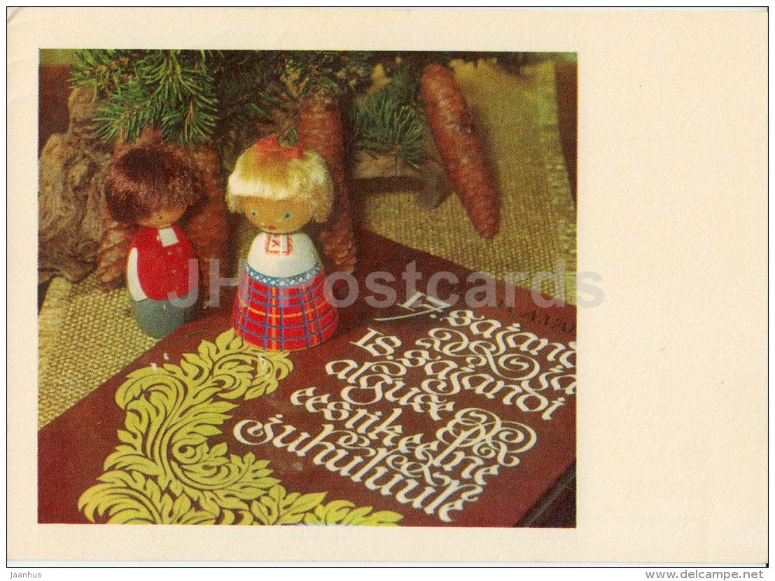 New Year Greeting card - dolls in estonian folk costumes - book - cones - 1974 - Estonia USSR - used - JH Postcards