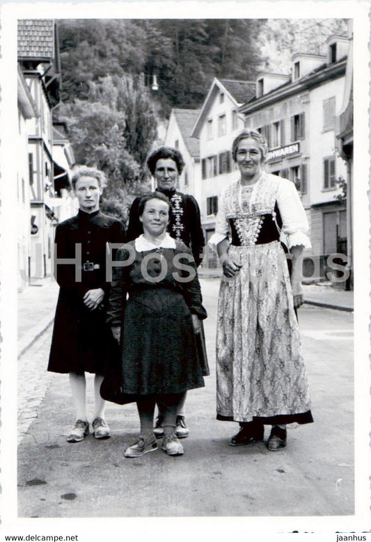 Women - folk costumes - old postcard - Switzerland - unused - JH Postcards