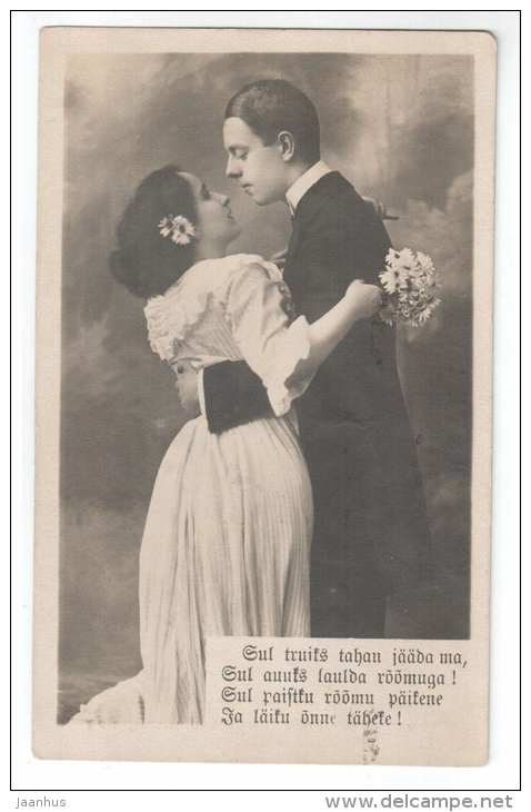 Woman and Man - flowers - couple - old postcard - circulated in Estonia 1922 - used - JH Postcards
