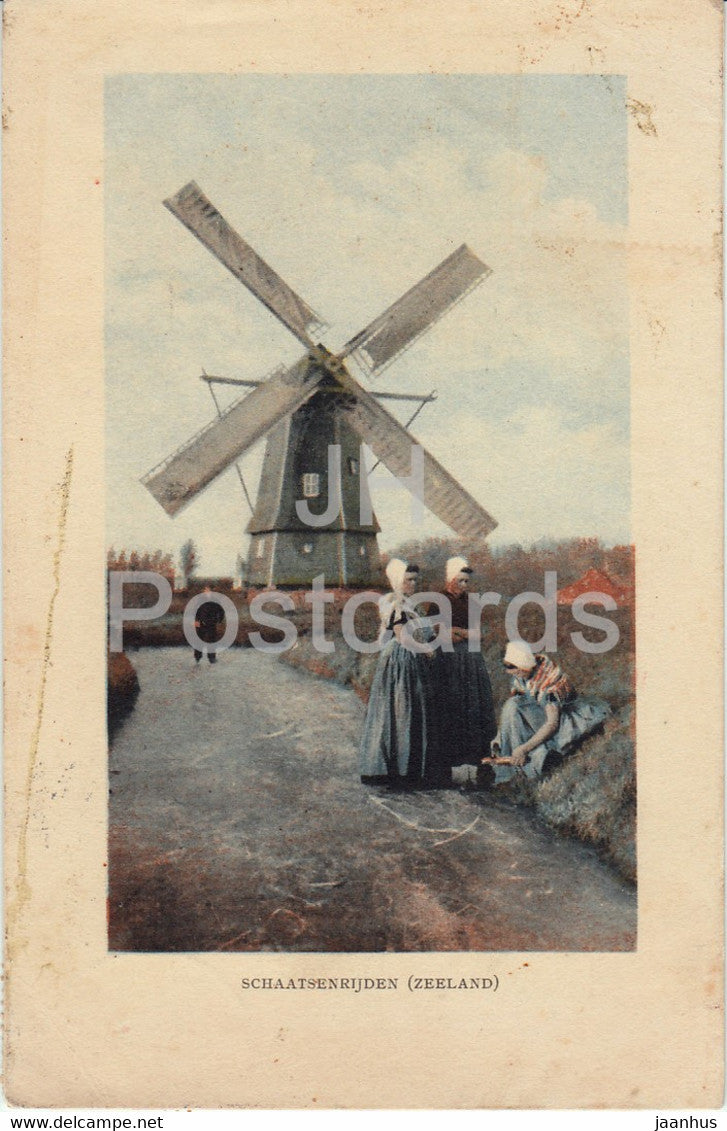 Schaatsenrijden - Zeeland - ice skating - windmill - old postcard - Netherlands - used - JH Postcards