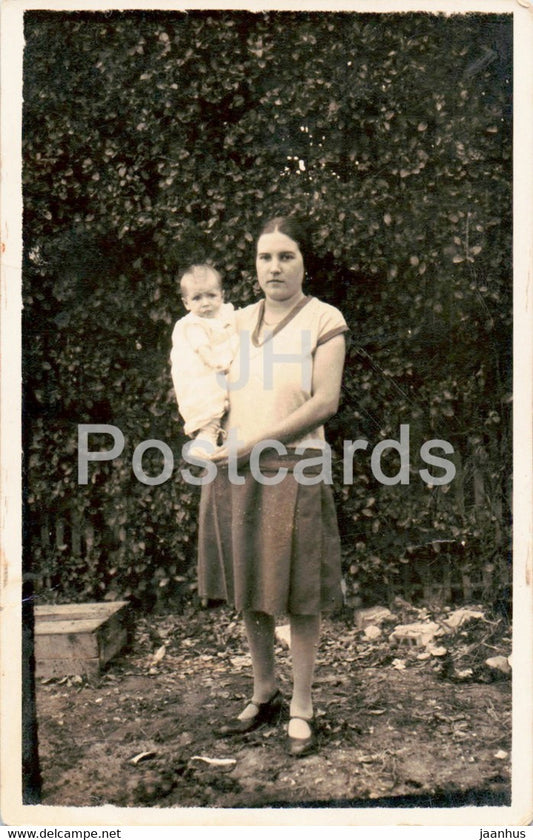 woman and child - old postcard - France - used - JH Postcards