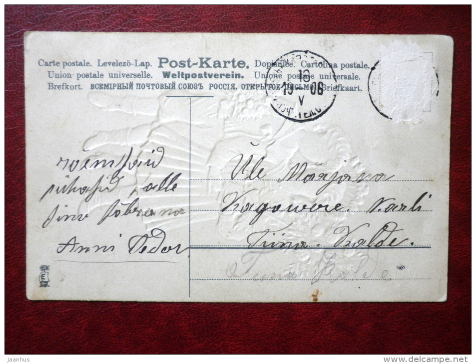Christmas Greeting Card - boy and girl with flowers - embossed - E - circulated in 1906 - Estonia - Tsarist Russia  used - JH Postcards