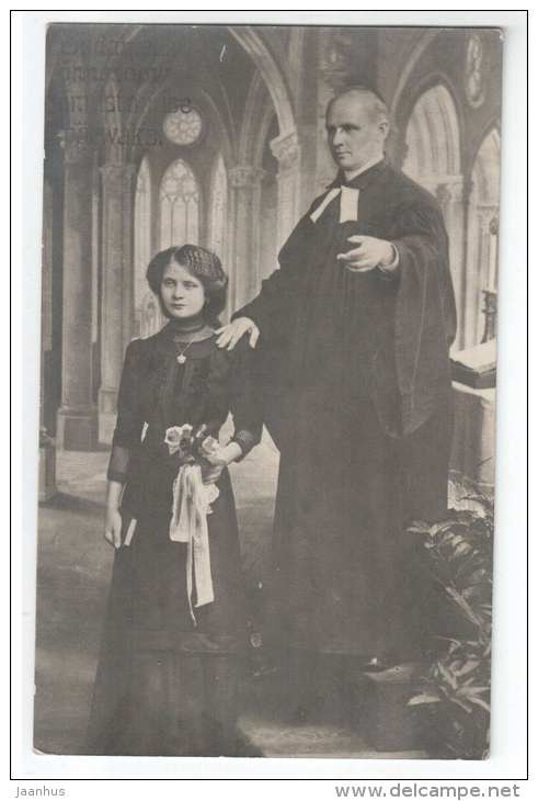 Young woman and minister - flowers - church - old postcard - circulated in Estonia - used - JH Postcards