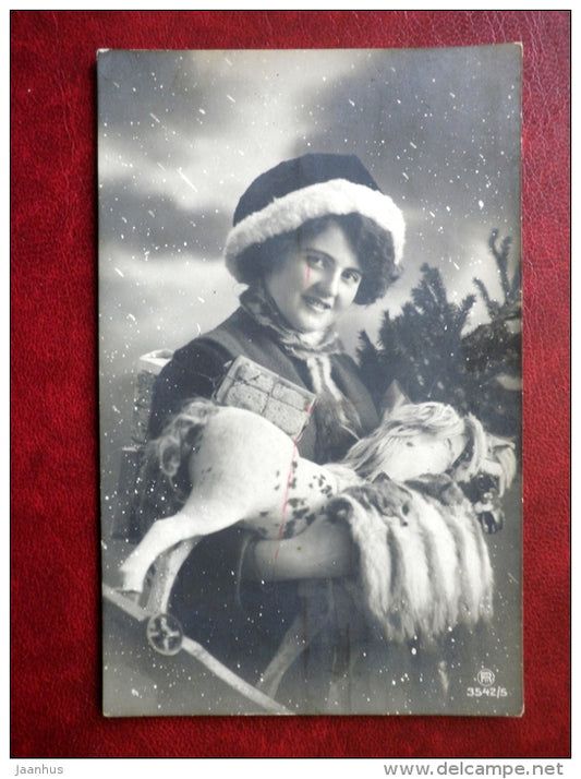 woman with toy horse - RPH No 3542/5 - circulated in Tsarist Russia 1912 , Riga - used - JH Postcards