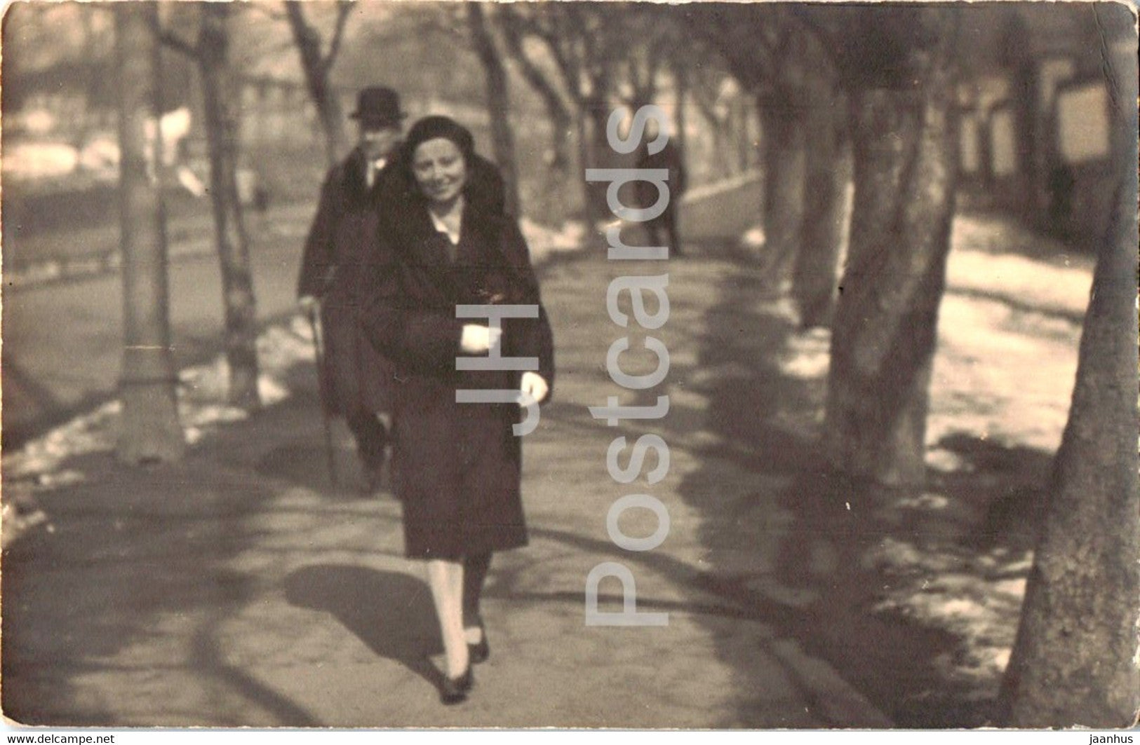 woman on the street of France - old postcard - France - unused - JH Postcards